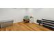 Spacious basement area with hardwood floors and ample room for storage or customization at 320 Orion St, Golden, CO 80401
