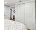Bedroom view showcasing closet space and bathroom access at 320 Orion St, Golden, CO 80401