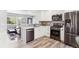 Modern kitchen featuring stainless steel appliances, white cabinets, and stylish countertops at 320 Orion St, Golden, CO 80401