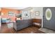 Cozy living room featuring hardwood floors, a large window, and stylish decor at 320 Orion St, Golden, CO 80401
