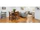 Open living space with wood floors, dining area, and comfortable seating arrangement at 320 Orion St, Golden, CO 80401