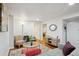Bright living space with a cozy seating area and open doorway at 320 Orion St, Golden, CO 80401