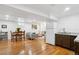 Open floor plan with living area, dining space, and kitchenette at 320 Orion St, Golden, CO 80401
