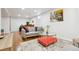 Cozy living room with a sofa, colorful rug, and stylish decor elements at 320 Orion St, Golden, CO 80401