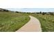 Scenic view of a walking path in a green space, perfect for outdoor activities and enjoying nature at 320 Orion St, Golden, CO 80401