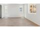 Bright, open living room with large windows and stylish hardwood flooring at 449 S Salida St, Aurora, CO 80017