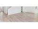 Bright, open living room with large windows and stylish hardwood flooring at 449 S Salida St, Aurora, CO 80017