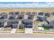 New construction homes in a Primary-planned community with sidewalks, basketball court, and open spaces at 7240 S White Crow Way, Aurora, CO 80016