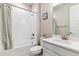 Bathroom featuring subway tile, a soaking tub, and a shower at 7240 S White Crow Way, Aurora, CO 80016