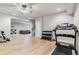 Large rec room with workout equipment and sitting area at 7240 S White Crow Way, Aurora, CO 80016