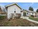 Backyard featuring a cement walkway and partial privacy fence at 3226 S Grant St, Englewood, CO 80113