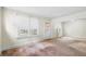 Bright living room featuring large windows and natural light at 3226 S Grant St, Englewood, CO 80113