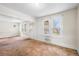 Spacious living room with neutral walls and natural light at 3226 S Grant St, Englewood, CO 80113