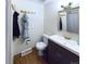 Cozy bathroom featuring a light wood floor, a toilet, vanity and a mirror at 4667 Ashfield Dr, Boulder, CO 80301