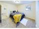 Inviting bedroom showcasing a comfortable bed and bright natural light at 4667 Ashfield Dr, Boulder, CO 80301