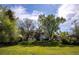 Charming home nestled among mature trees, set back on a well manicured lawn, creating a peaceful and private setting at 4667 Ashfield Dr, Boulder, CO 80301