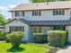 Charming home with meticulous landscaping, flowering bushes, and a welcoming front entrance at 4667 Ashfield Dr, Boulder, CO 80301