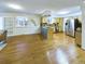 Open-concept kitchen with wood floors, stainless steel appliances, and a functional kitchen island at 4667 Ashfield Dr, Boulder, CO 80301