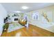 Spacious living room with a fireplace, built-in shelves, and sliding glass doors to the outside at 4667 Ashfield Dr, Boulder, CO 80301