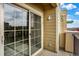 A sliding glass door leads to this balcony with lots of natural light at 1144 Rockhurst Dr # 401, Highlands Ranch, CO 80129