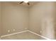 Neutral bedroom with a ceiling fan and neutral carpet at 1144 Rockhurst Dr # 401, Highlands Ranch, CO 80129