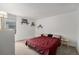 Functional bedroom with minimalist decor, natural light, and city views through the window at 1020 15Th St # 12C, Denver, CO 80202
