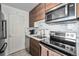 Well-equipped kitchen with stainless steel appliances, stylish cabinets, and modern fixtures at 1020 15Th St # 12C, Denver, CO 80202