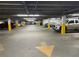 Spacious parking garage with concrete floors and a truck in view at 1020 15Th St # 12C, Denver, CO 80202