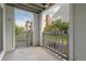 Charming outdoor patio featuring a gray wood fence, perfect for relaxing or entertaining guests at 3341 S Monaco Pkwy # A, Denver, CO 80222