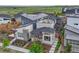Bird's-eye view of modern homes highlighting architectural details, rooftop terrace, and community landscaping at 6366 N Emporia St, Denver, CO 80238