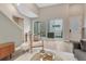 Bright living room with access to outdoor patio and modern interior design at 6366 N Emporia St, Denver, CO 80238