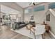 Bright living room with modern décor and an open view to the kitchen at 6366 N Emporia St, Denver, CO 80238