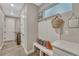 Organized mudroom with a bench, storage, and a convenient layout, providing a functional space for entry and storage at 6366 N Emporia St, Denver, CO 80238