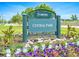 Central Park Denver sign surrounded by colorful flowers creates an inviting entrance to this beautiful park at 6366 N Emporia St, Denver, CO 80238