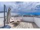 Comfortable outdoor patio area with lounge furniture and shaded umbrella at 6366 N Emporia St, Denver, CO 80238