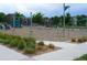Outdoor playground features climbing structures and exercise equipment amidst landscaped grounds and walking paths at 6366 N Emporia St, Denver, CO 80238