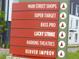 Exterior shot of a shopping center sign with a list of various stores in the neighborhood at 6366 N Emporia St, Denver, CO 80238