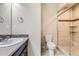 Bathroom featuring a shower with glass door, and a granite countertop vanity at 2564 Sweet Wind Ave, Castle Rock, CO 80109