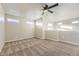 Bedroom featuring a ceiling fan, soft carpeting, and lots of natural light at 2564 Sweet Wind Ave, Castle Rock, CO 80109