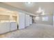 Basement laundry room with carpet, washer and dryer, and closet with shelves at 2564 Sweet Wind Ave, Castle Rock, CO 80109