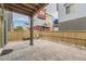 Back patio with brick pavers, wood fence and overhead wood structure at 2564 Sweet Wind Ave, Castle Rock, CO 80109