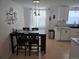 Kitchen dining area with table and four chairs at 1227 Aspen St, Longmont, CO 80501