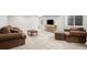 Finished basement with carpeting and multiple seating options at 224 S Jackson Gap Way, Aurora, CO 80018