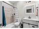 Modern bathroom featuring neutral tiling in the shower, and modern fixtures at 224 S Jackson Gap Way, Aurora, CO 80018