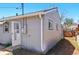 Exterior shot of a house exhibiting its siding and windows in a residential neighborhood at 764 S Osage St, Denver, CO 80223