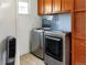 Convenient laundry room equipped with modern washer and dryer units for efficient laundry care at 764 S Osage St, Denver, CO 80223
