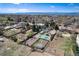 Expansive aerial view of a neighborhood featuring mature trees, lawns and open spaces, showcasing the community's picturesque setting at 6192 S Pennsylvania St, Centennial, CO 80121