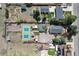 Aerial view of property with backyard, tennis court and surrounding neighborhood at 6192 S Pennsylvania St, Centennial, CO 80121