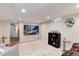 Finished basement with entertainment system, TV, and comfortable seating at 6192 S Pennsylvania St, Centennial, CO 80121