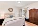 Bedroom with natural light, hardwood floors, and a neutral color scheme at 6192 S Pennsylvania St, Centennial, CO 80121